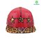 Six panel imitation leather snapback cap with embroidery patch logo