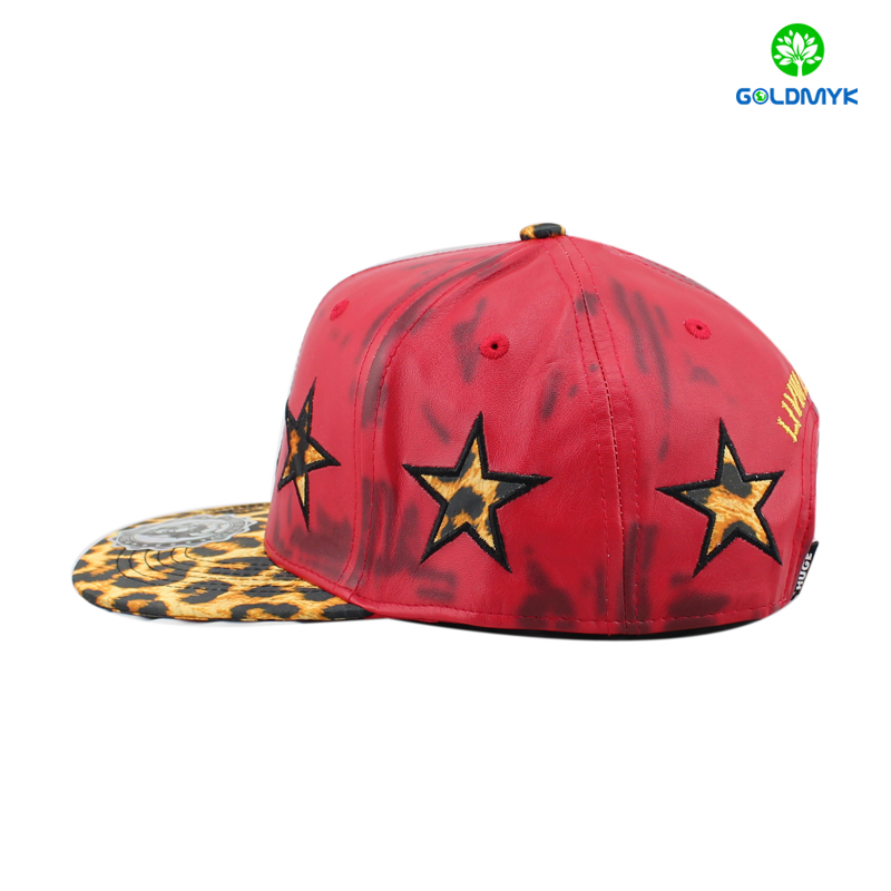 Six panel imitation leather snapback cap with embroidery patch logo