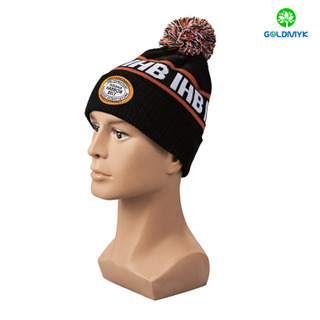 Black intasia pattern and patch embroidery Beanie hat with pom pom