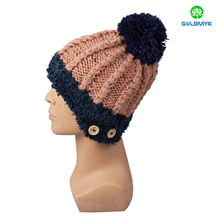 Twist knitted hat with pom pom