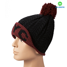 Twist knitted hat with intasia logo and pom pom